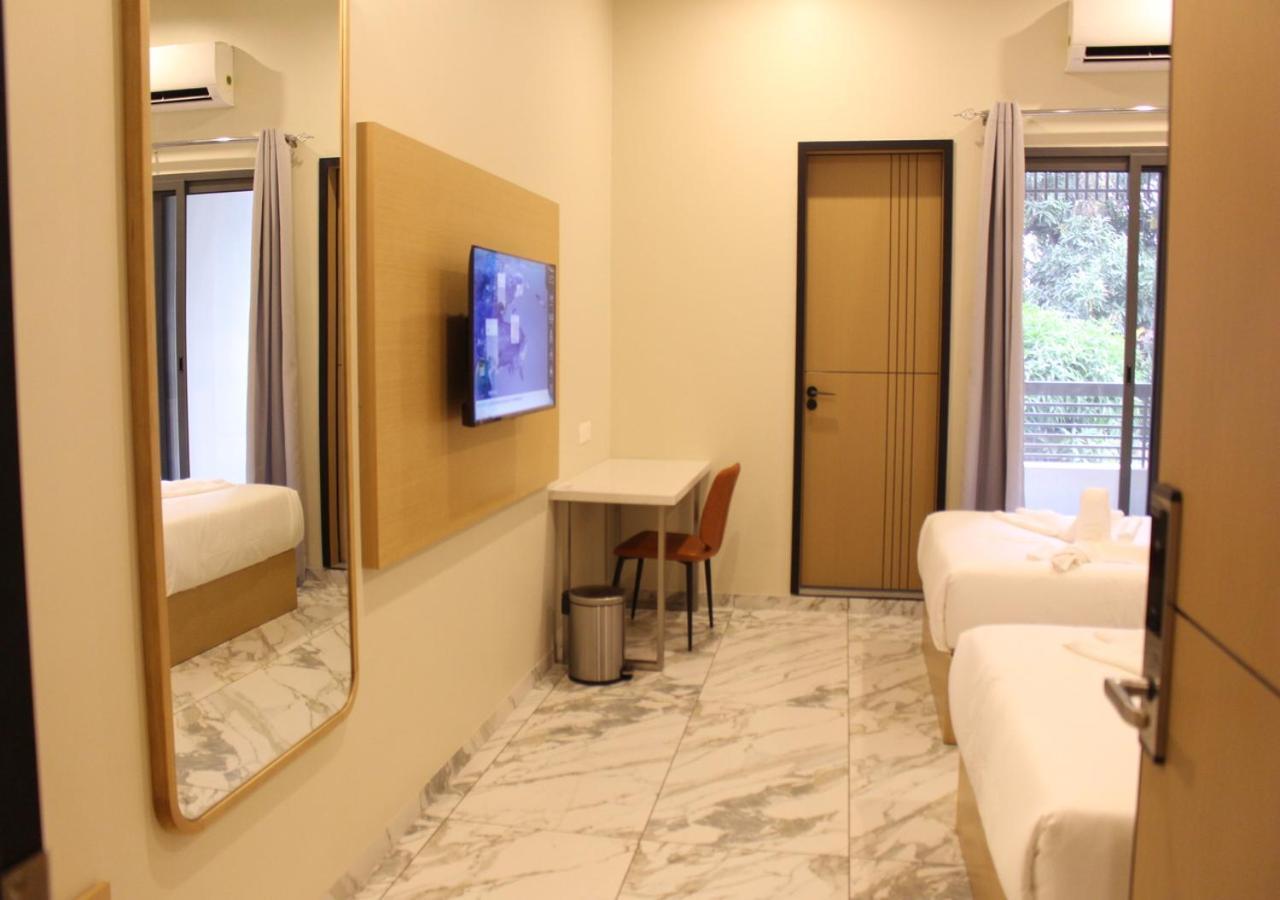 Ixoras Hotel Lemba 金沙萨 外观 照片